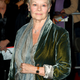 Dench, a knighted member of the British Empire and notorious tabloid trash.